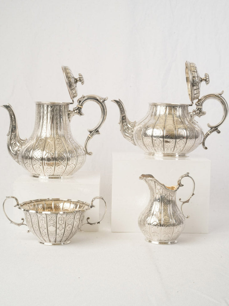 Hand-chased intricately designed tea set  