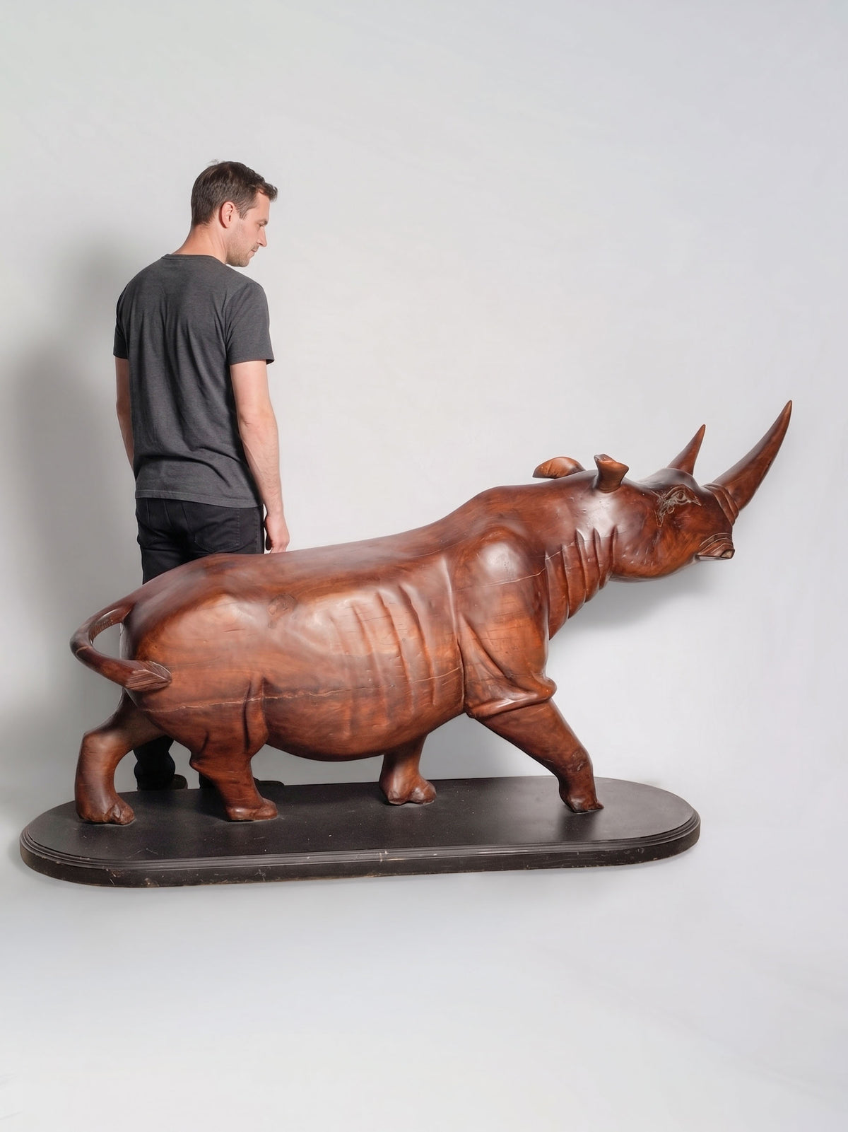 Monumental Mid-Century Monoxylous Hand-Carved Hardwood Rhinoceros, c. 1960 - 41"  x 75½"