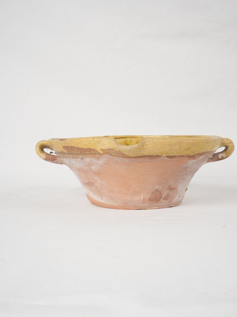Antique ear-shaped handle bowl