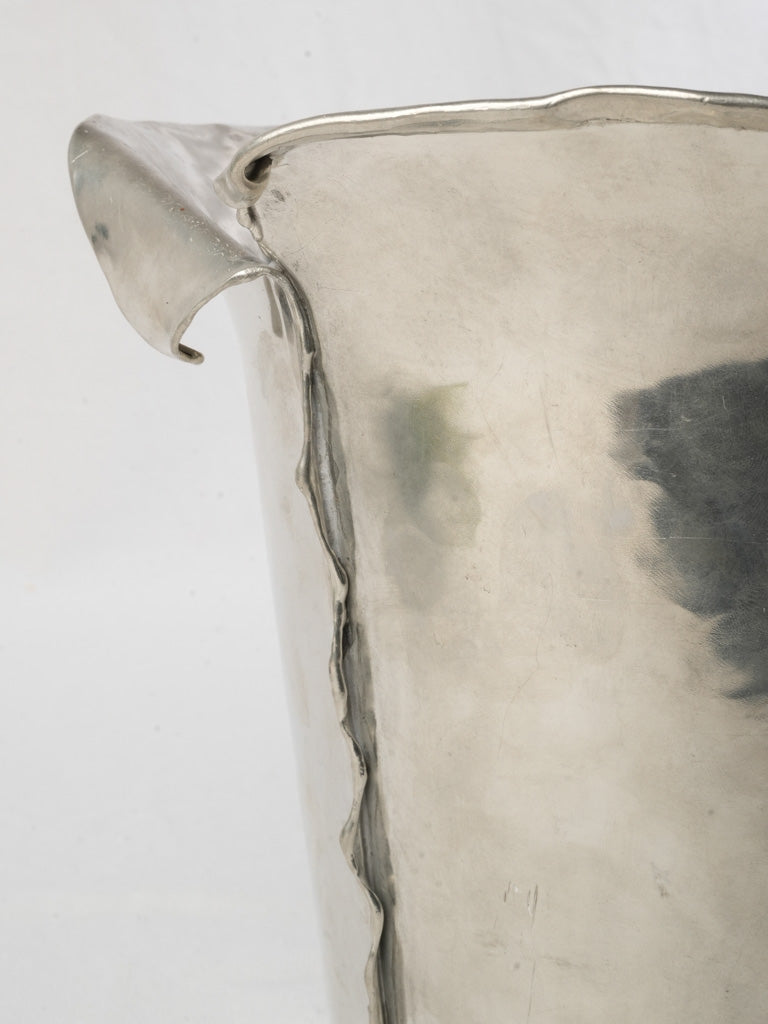 Tactile characterized pewter vase