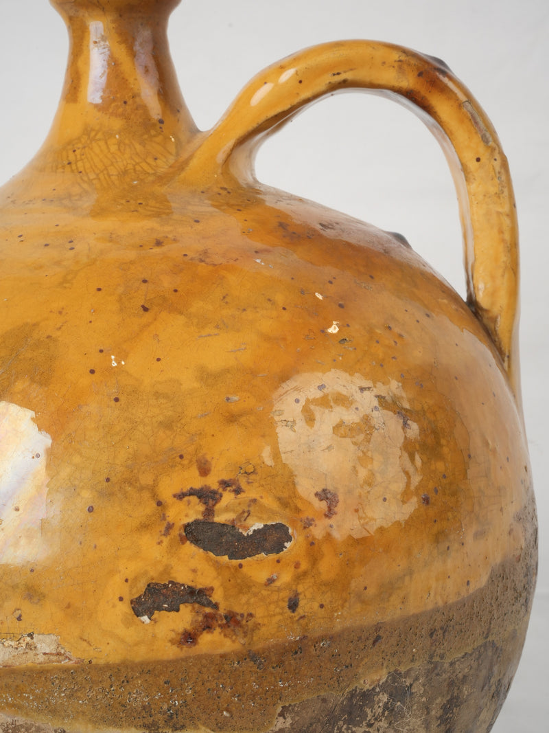 Antique ocher glazed wine vessel