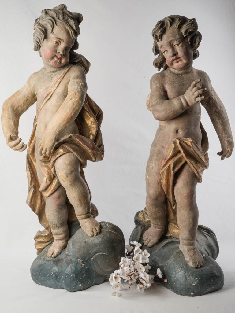 Baroque style carved angel figures  