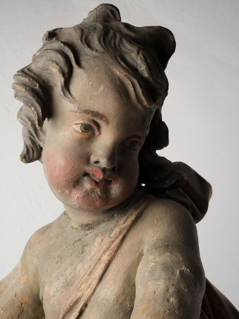 Elegant gesso adorned putti decor  