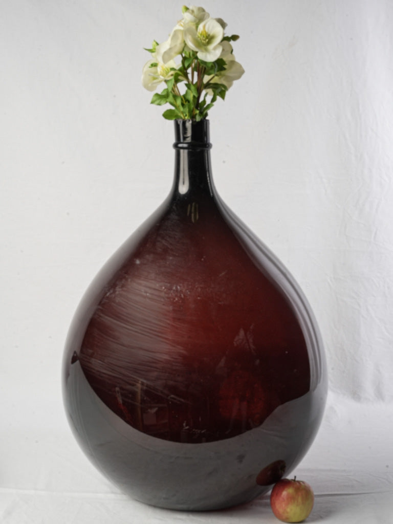Antique hand-blown glass demijohn