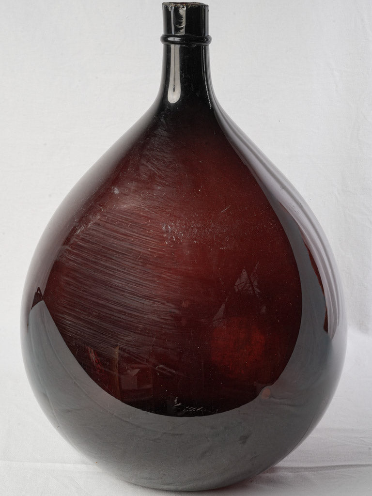 Elegant plum Italian demijohn