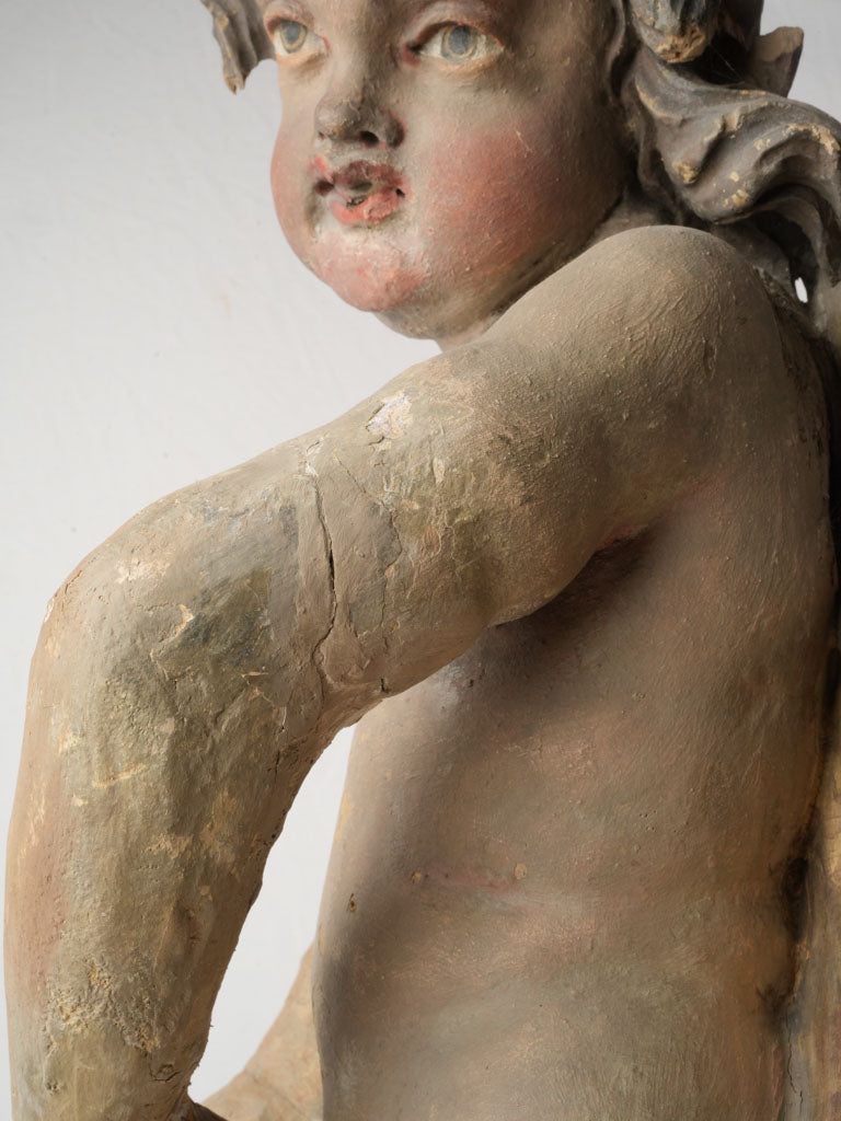 Historic hand-carved wooden cherubs  