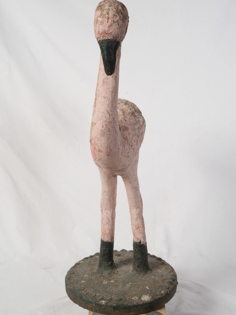 Subtly aged concrete flamingo statue