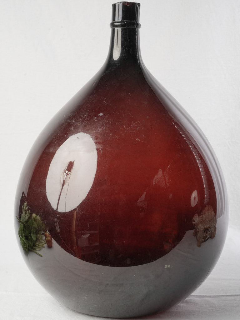 Historic plum tone glass bottle