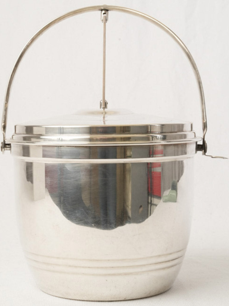 Silver cylindrical ice bucket  