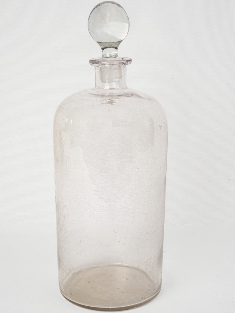 Vintage clear apothecary glass bottle