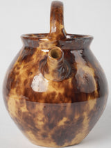 Traditional French yellow glazed water jug