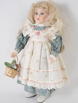 Elegant, petite French floral porcelain doll