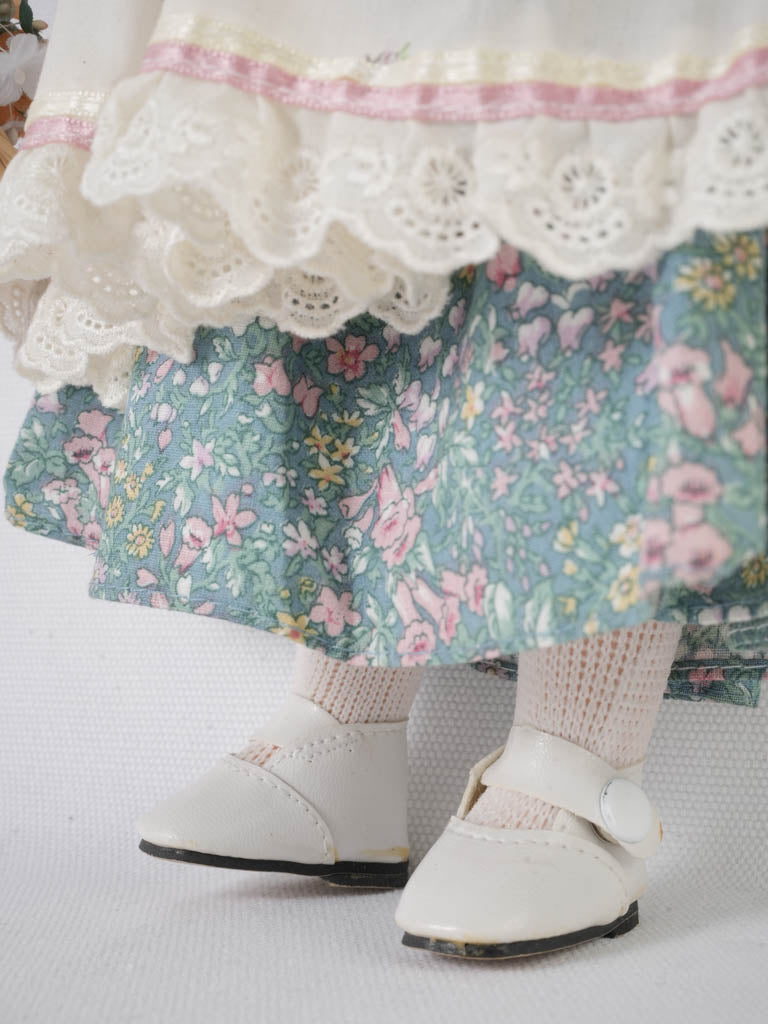 Refined, delicate blonde hair porcelain doll