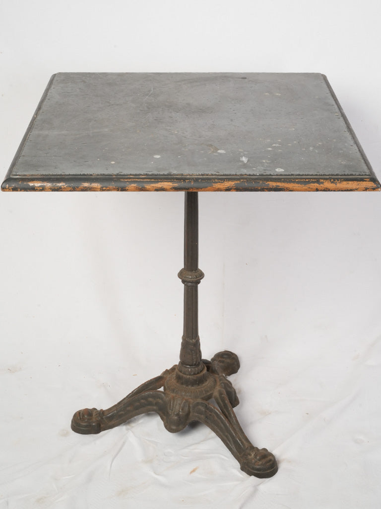 Graceful iron base bistro table  