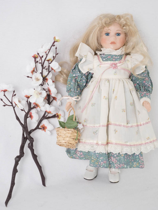Vintage, collectible blonde hair porcelain doll