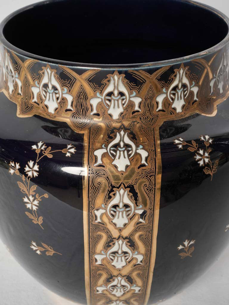 Elegant gilt decorated ceramic vase.
