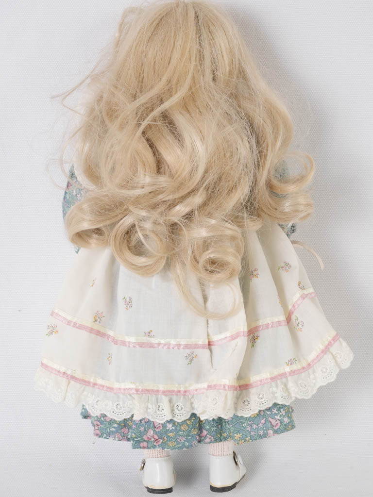 Precious, lovely blonde hair porcelain doll