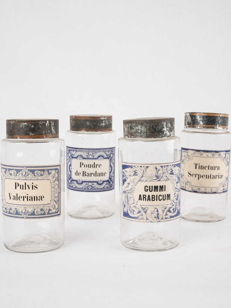 4 apothecary jars - blue & white labels 8¼"