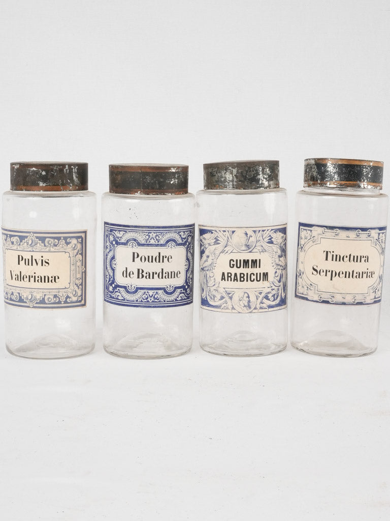 4 apothecary jars - blue & white labels 8¼"