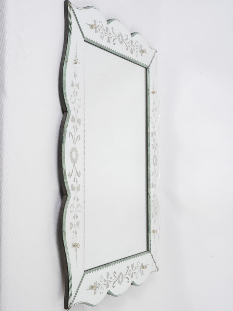 Scalloped, vintage Venetian mirror