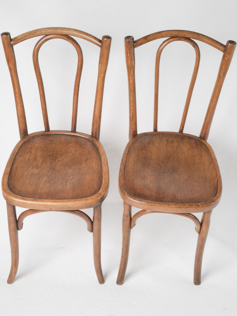Classic Thonet-style saber leg chairs