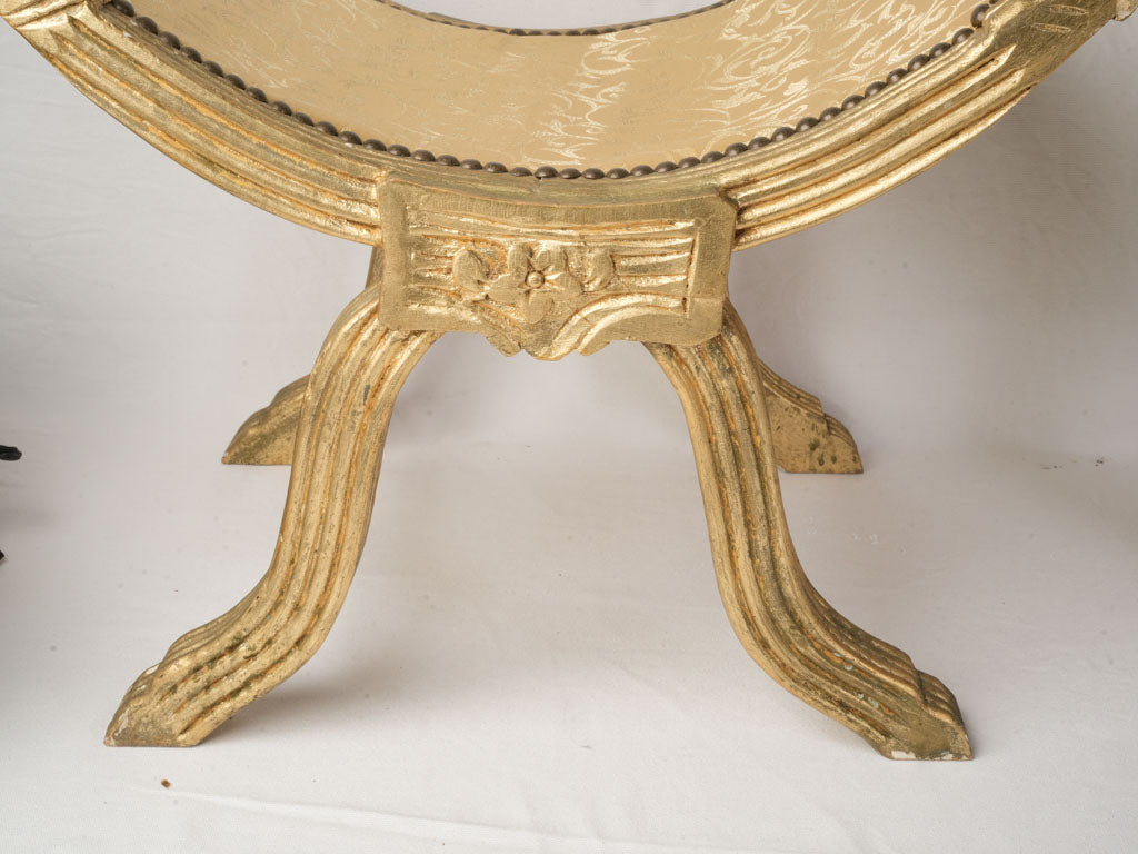 Decorative aged wooden curule chair  