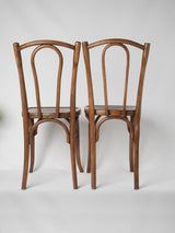 Charming age-worn wooden bistro chairs 