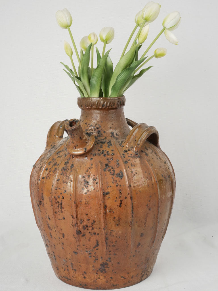 Rustic French walnut oil jar  