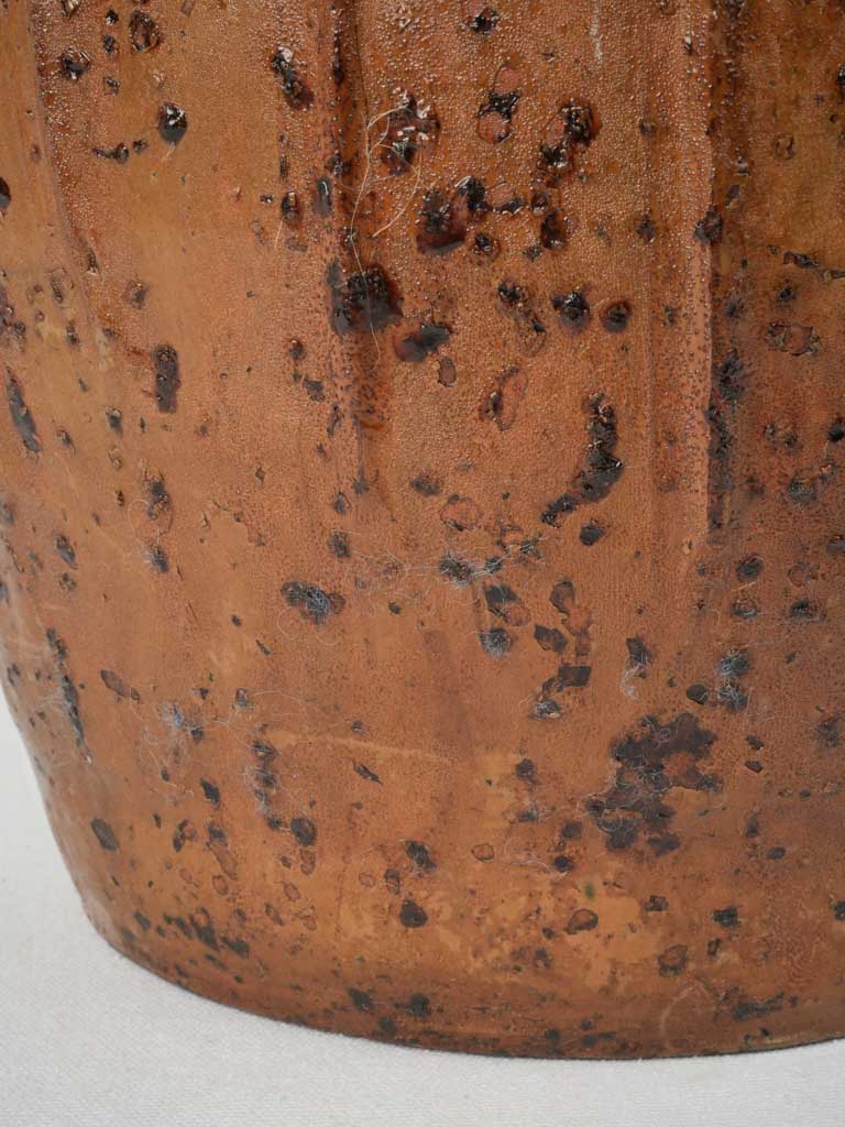 Curved handle terracotta oil jar  