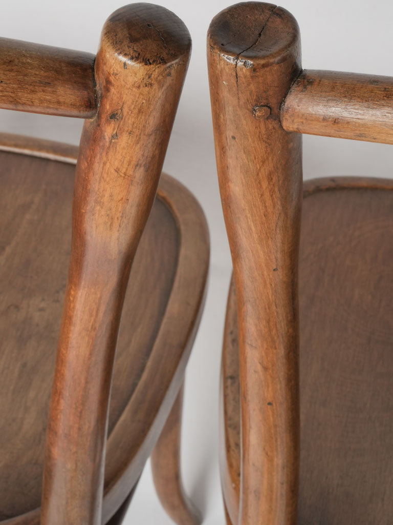 Timeless aged curved wooden chairs