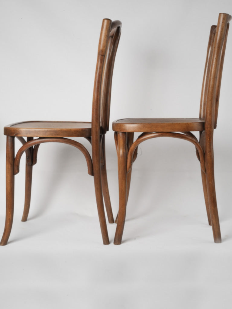 Elegant French curved-back chairs