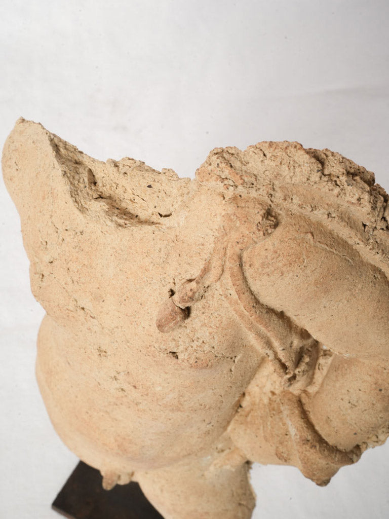 Textured terracotta torso statuette