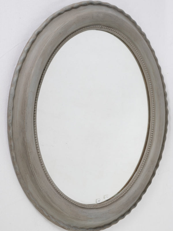Antique French grey-painted oval mirror