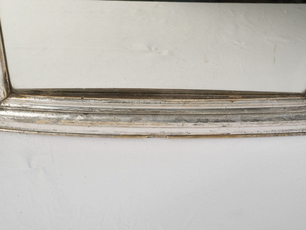 Subtle timeworn character mirror