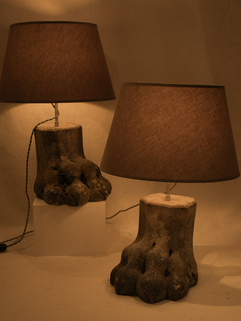 Sculptural lion's paw stone lamps  