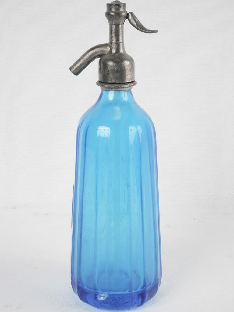 Nostalgic blue glass seltzer container