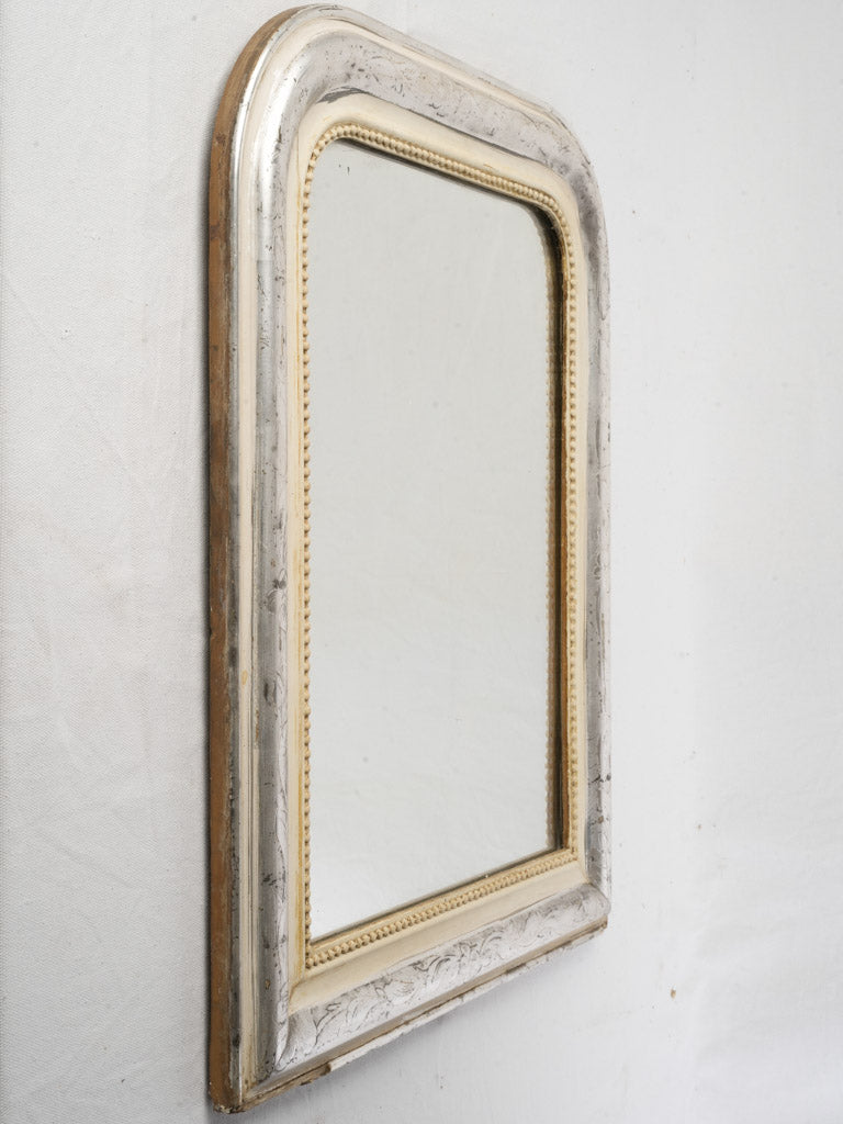 Sophisticated cream-toned border mirror  