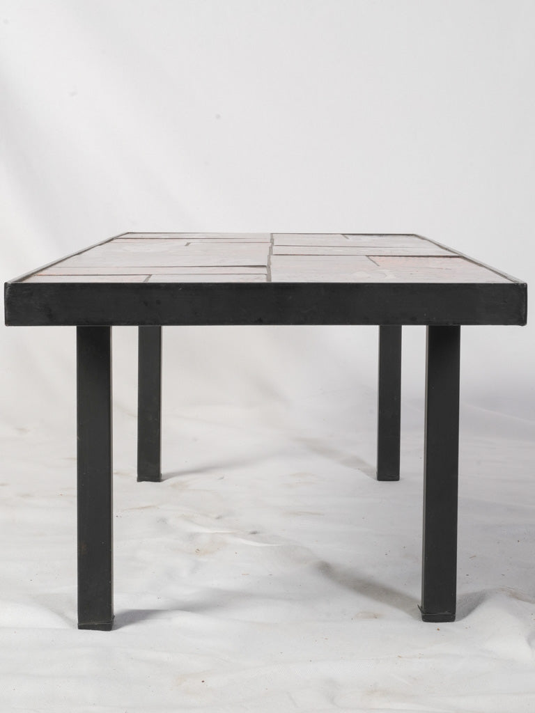Sleek black metal frame table
