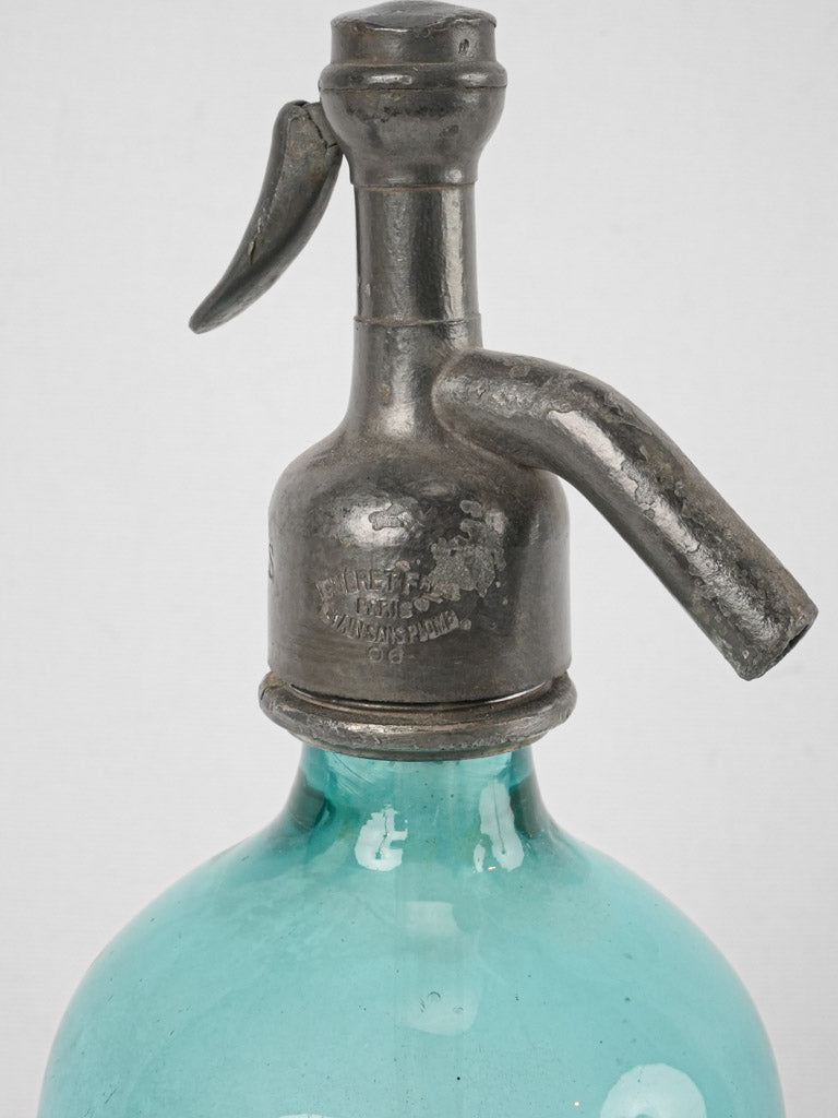 Time-worn Mâcon seltzer dispensing bottle