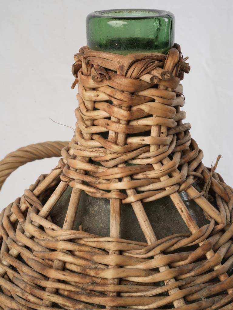 Shapely bohemian wicker-covered vessel  