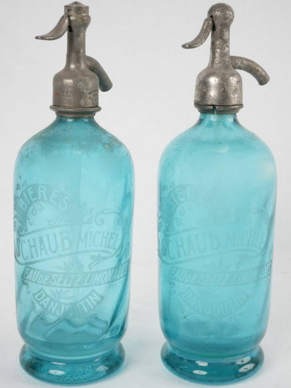 Antique blue glass siphon bottles