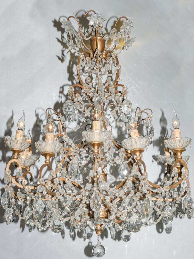 Opulent gilded bronze crystal chandelier