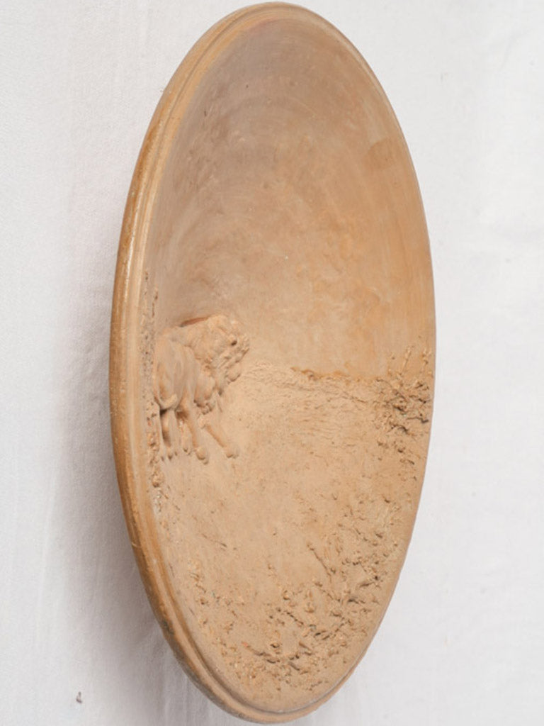 Expressive naturalistic terracotta wall decor