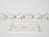 Ornate antique porcelain cream pots