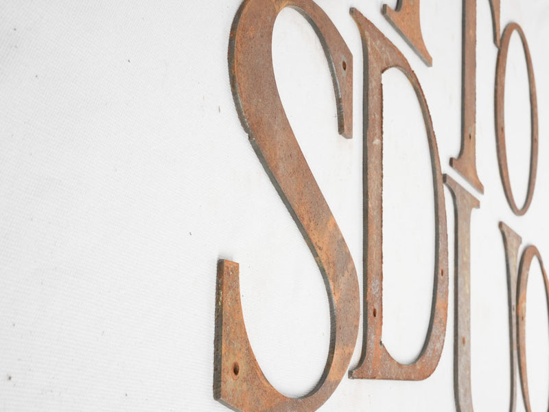 Collection of 8 vintage iron letters from a sign 10"