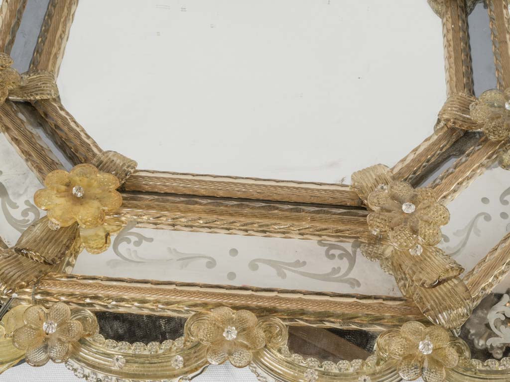 Lavish yellow-embellished vintage Venetian mirror