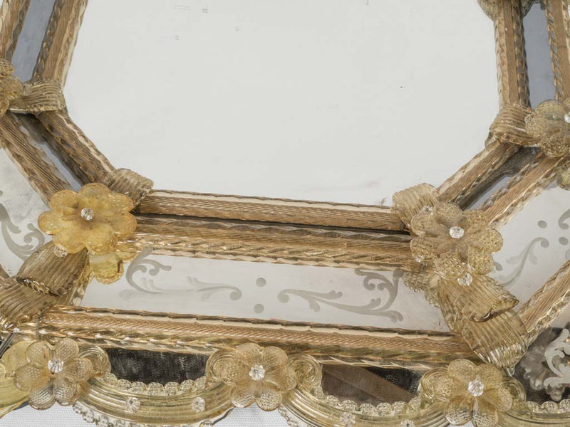 Lavish yellow-embellished vintage Venetian mirror