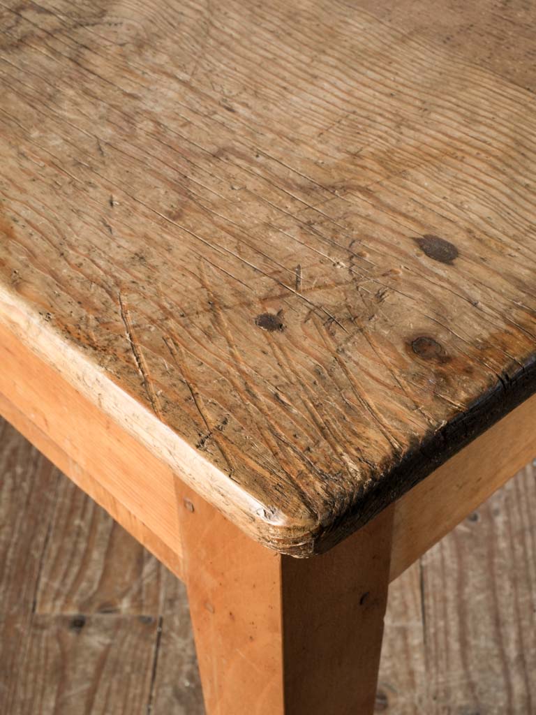 Aged honey-toned farmhouse table  