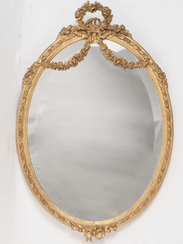 Antique Louis XVI French gilded oval mirror