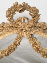 Charming, ornate oval gilded French mirror